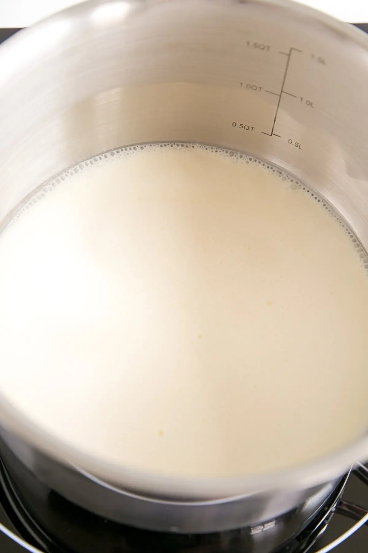 cream simmering in a pot.