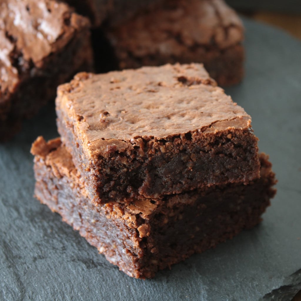A close up of a piece of a brownie.