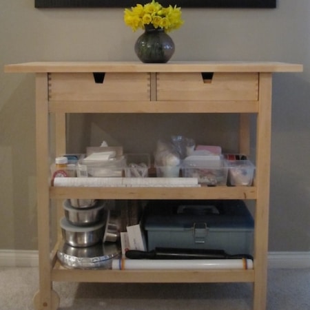 Cart with cake tools on it.