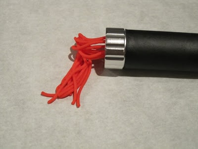 Red fondant coming out of the extruder.