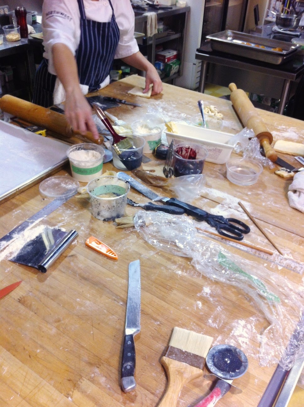 A person cutting food on a table