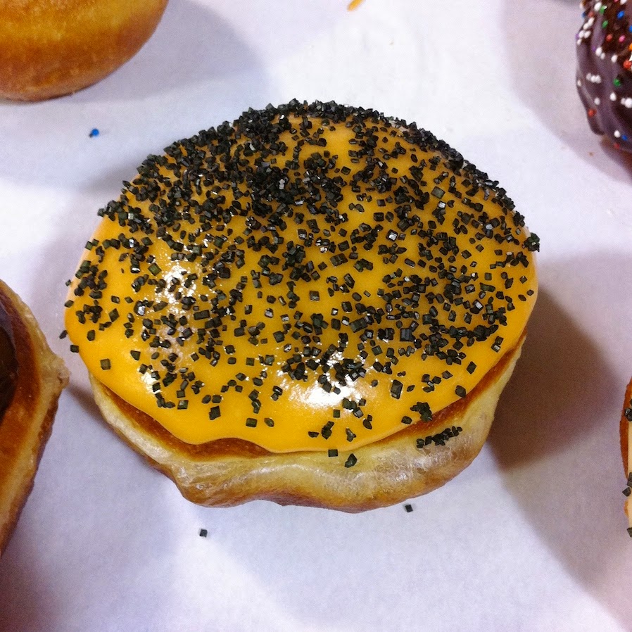 A doughnut sitting on top of a table