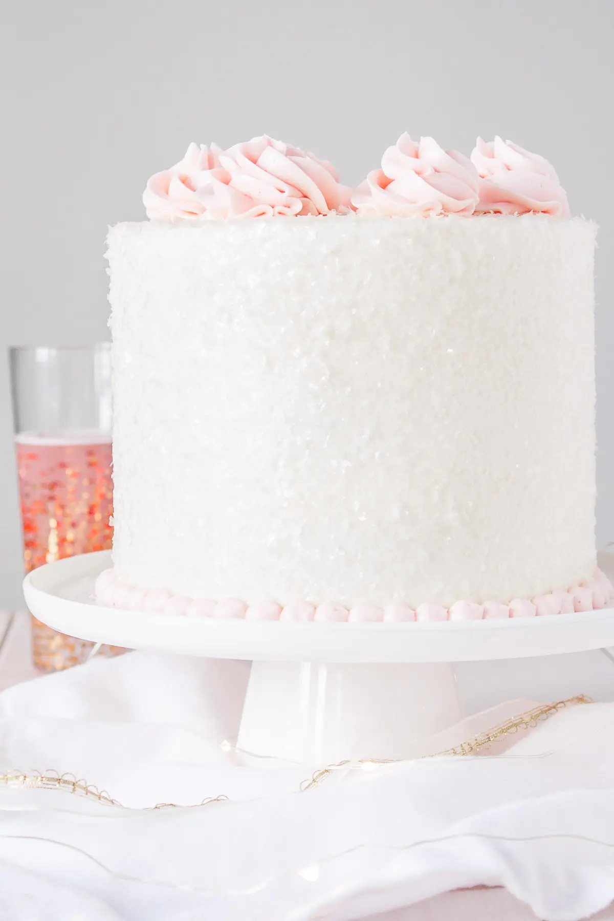 This Pink Champagne Cake is the perfect way to celebrate any occasion or holiday! A champagne infused cake with a classic vanilla buttercream. | livforcake.com This Pink Champagne Cake is the perfect way to celebrate any occasion or holiday!