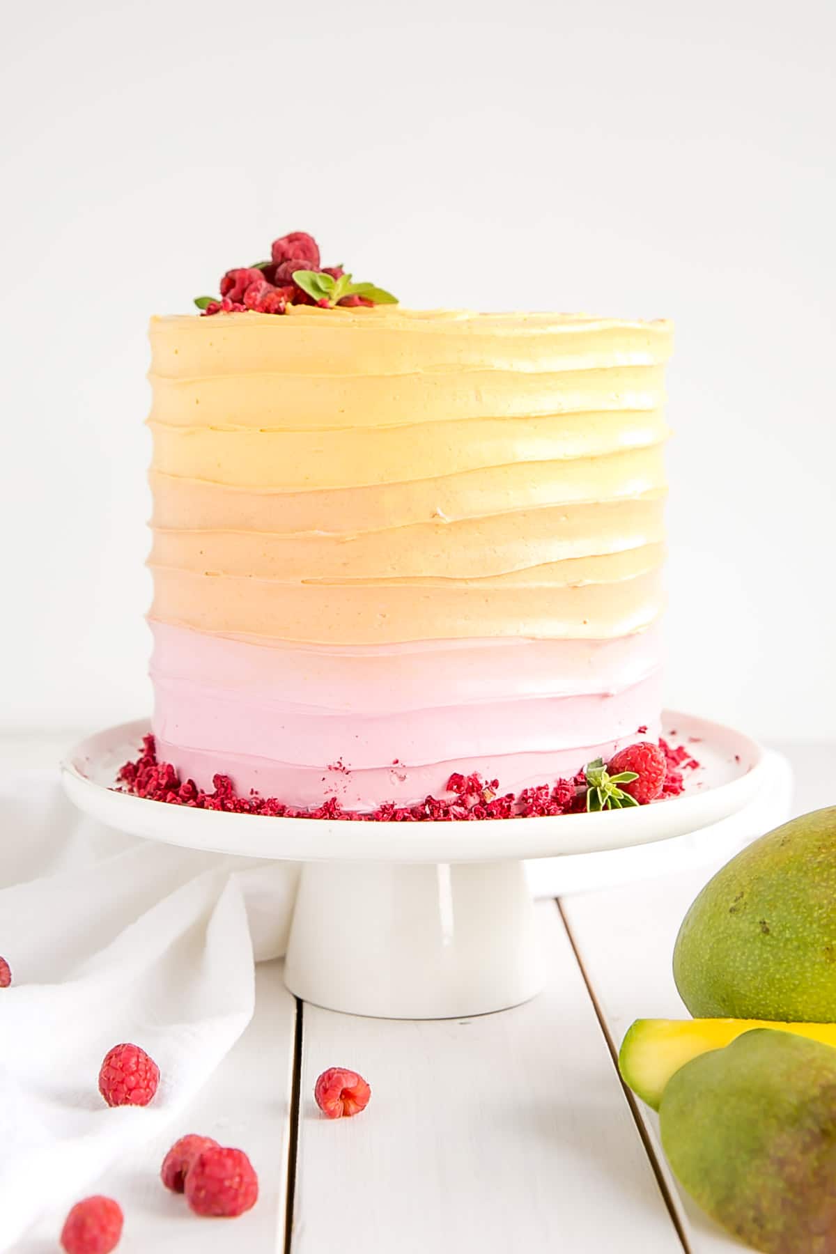 Raspberry Mango Cake - raspberry cake layers and a mango frosting.