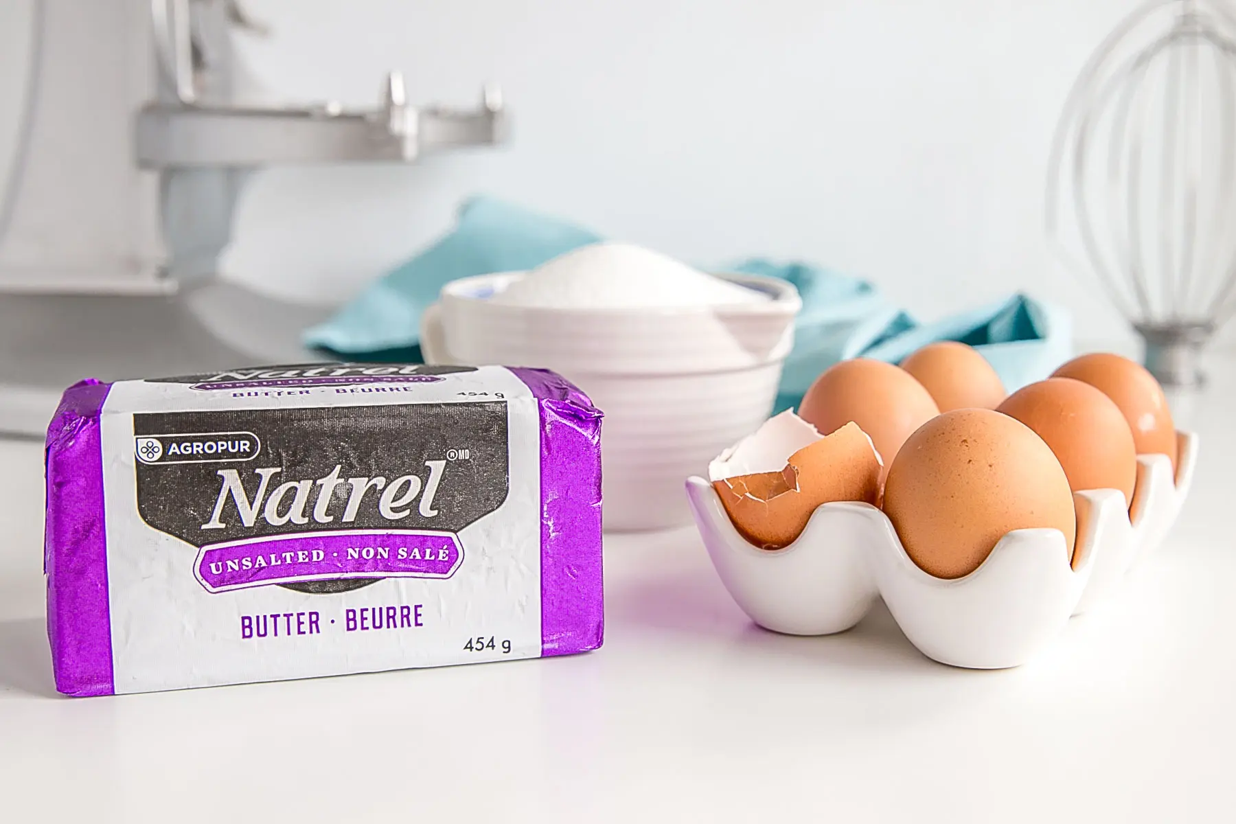 This tutorial on how to make Swiss Meringue buttercream is the only resource you'll need to make the smoothest, silkiest frosting! | livforcake.com Swiss Meringue buttercream ingredients - butter, eggs, sugar.